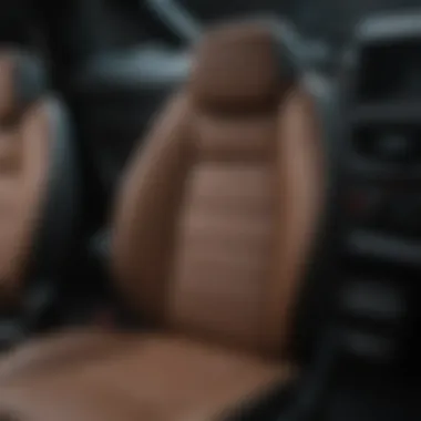 Before and after image showing the effect of leather conditioning on a car seat