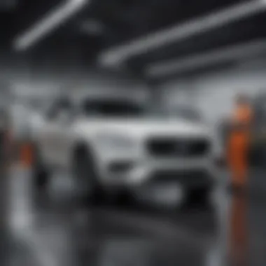 Inside view of Autonation Volvo's service area with technicians at work.