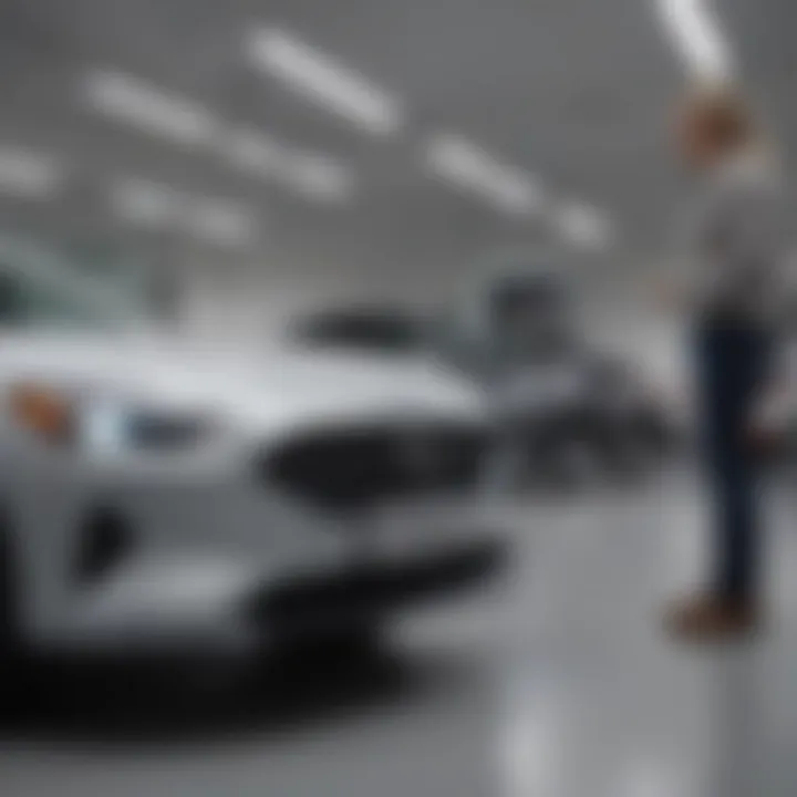 A customer examining a new Hyundai vehicle inside the showroom